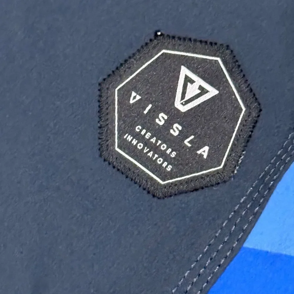 VISSLA Men’s 31 Dark Blue Board Shorts with Red and Blue Rainbow Stripes
